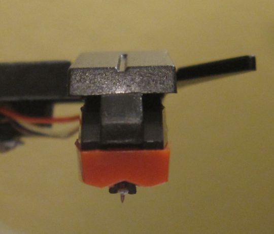 Close-up photo shows a vertical stylus attached to the Grace Digital Audio Vinylwriter (AVPUSB01S) USB turntable.