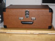 Photo of Crosley CR249 closed. Resembles a piece of luggage.