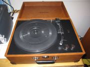 Photo of Crosley, case open, showing the platter, tonearm and controls.