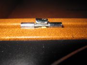 Close-up of bent hinges on Crosley CR249.