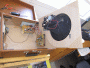 Photo shows the Crosley CR249 inside the case. The belt is dangling underneath the pulley.
